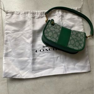 Mini green monogram COACH bag